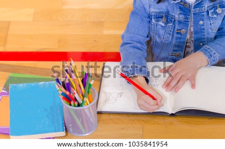 little girl writing paper, smiling cute child, Little girl painting in library, children education and development, copy space