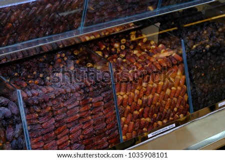 Raw Organic Dates arranged in showcase - Date is a symbol of wealth and abundance and has a special place in Islamic history and cultures