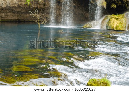 View on waterfall in mountain. Place for hiking. 