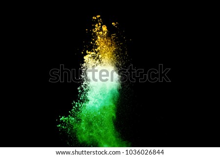 Flag of India made with colorful powder splashes isolated on black background.
