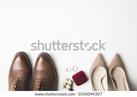 top view of pair of grooms shoes isolated on white Royalty-Free Stock Photo #1036044307