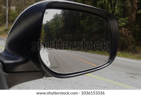 a car mirror for watch back
