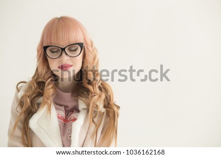 horizontal Portrait of a beautiful Caucasian young woman in glasses, education, businesswoman