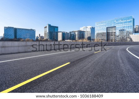 empty road with modern office building