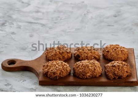 Top view close-up picture of tasty chocolate cookies on the cutting board, shallow depth of field, selective focus