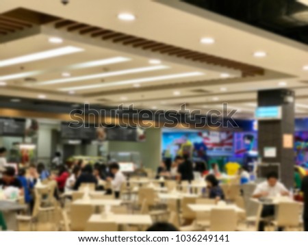 Abstract blurred photo of food court or food center