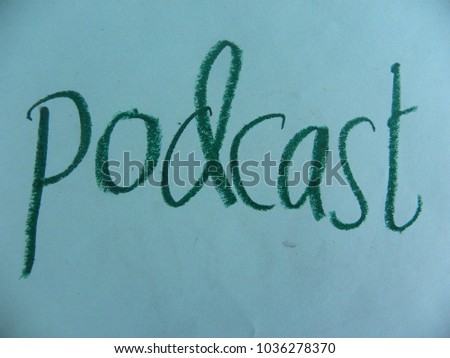 Text podcast written by dark green oil pastel on blue color paper