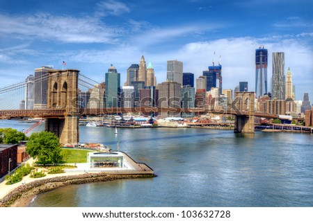 Brooklyn Bridge spans the East River towards Lower Manhattan in New York City.