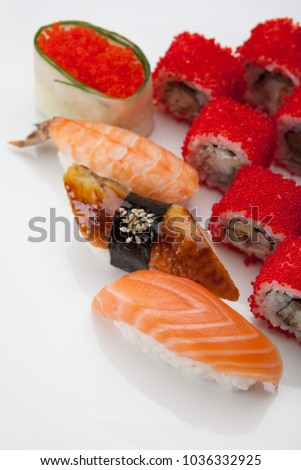 Red caviar, tuna, salmon and raw egg sushi set