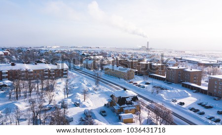 Aerial winter view of Kiruna, the northernmost town in Sweden, province of Lapland, winter sunny picture shot from drone