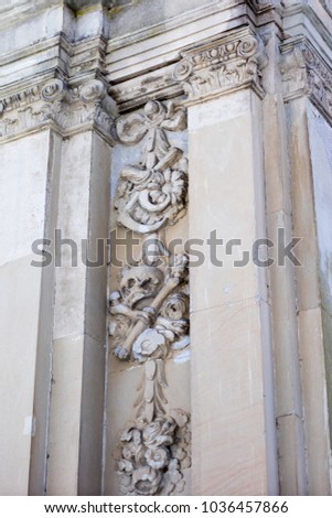 Antique decorations on the funeral chapel. A burial chapel standing next to the Teutonic castle in Poland. Season winter.