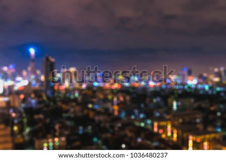Blurry Bangkok night view with skyscraper in business district, Bangkok Thailand
