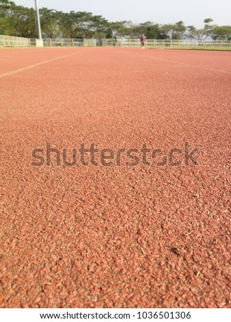  running track is a rubberized artificial running surface for track and field athletics. It provides a consistent surface for competitors to test their athletic ability unencumbered by adverse weather