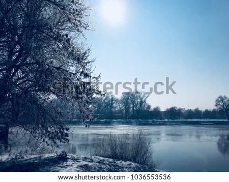 Landscape of frozen Tisza river in winter environment in Europe, Hungary, Szeged.
