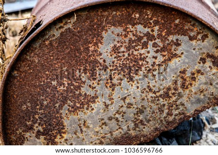 
Red rusty background on old steel tank