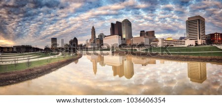 Panorama of the Columbus, Ohio skyline along the Scioto River in the downtown district of the city.