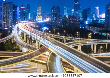 night view of rush-hour traffic in Nanpu overpass,elevated view,Shanghai,China.
