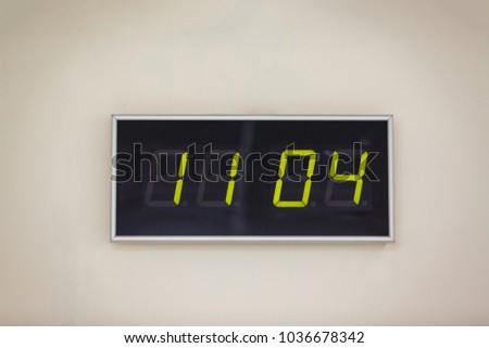 Black digital clock on a white background showing International Day of Fascist Concentration Camps Prisoners Liberation