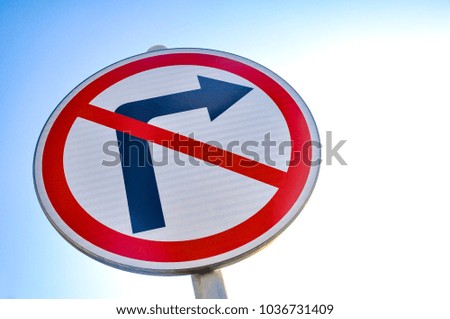 Traffic or road sign with a blue sky on a background