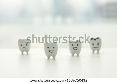 Human oral health icon - isolated healthy teeth and decayed teeth cartoon with smiley and sad face for kid education