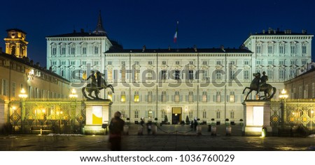 Image of Palazzo Reale illuminated at dusk at square  in Turin, Italy