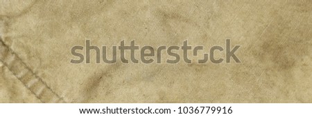 Old Military Army Faded Camouflage Fabric Backpack Or Bag Or Uniform Horizontal Background Or Rough Texture Close-up Top View