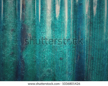 The green plastic background