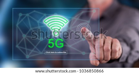 Man touching a 5g concept on a touch screen with his finger
