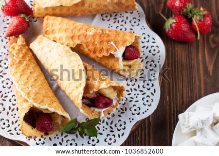 Delicious Campfire Cones filled marshmallow, chocolate, banana chips and fresh berries
