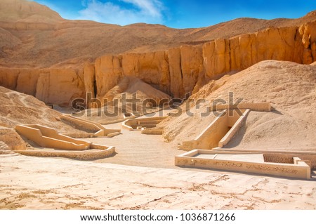 Valley of kings. The tombs of the pharaohs. Tutankhamun. Luxor. Egypt. Ancient monument of architecture. Museum. Excavation. Vacation holidays background wallpaper Royalty-Free Stock Photo #1036871266