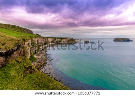Beautiful aerial view and wide angle of famous Northern Irish cliffs by Atlantic Ocean, along the coast of Northern Ireland. 