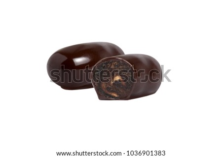chocolate candy macro shot with nuts and delicious filling on white background