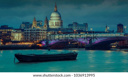 London's night skyline, looking at Blackfriars bridge and St. Pauls cathedral, London, UK. 