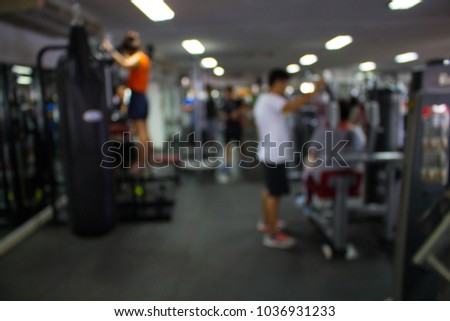 Blurred of fitness gym background