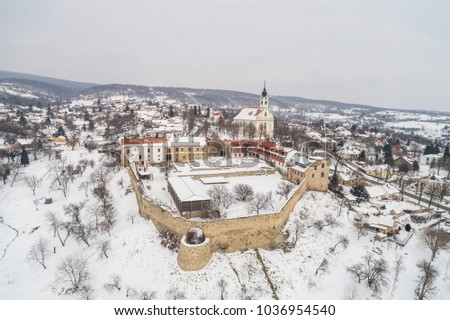 Beautiful church with fortress of Pecsvarad, Hungary at winter