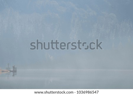 Over the foggy lake