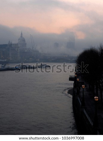 London's South Bank at dawn with St Paul's Cathedral in the distance