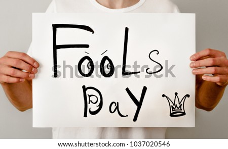 inscription fools day on a white poster, 1 april
