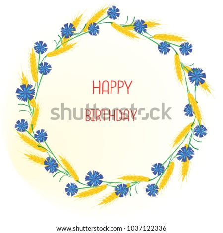 Flower frame from spikelets of wheat and cornflowers. It is possible to apply for a birthday greeting card.