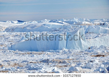 Greenland. Giant icebergs in the area of the village Ilulissat
