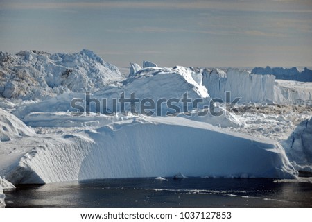 Greenland. Giant icebergs in the area of the village Ilulissat