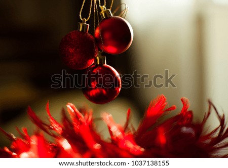 Beautiful Christmas decoration - red baubles on a blurred background