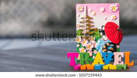 TRAVEL JAPAN words with Japanese theme fridge magnet in wooden table top