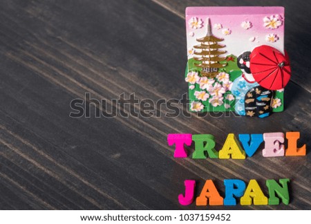 TRAVEL JAPAN words with Japanese theme fridge magnet in wooden table top