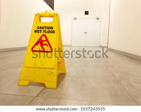 Warning sign on wet floor