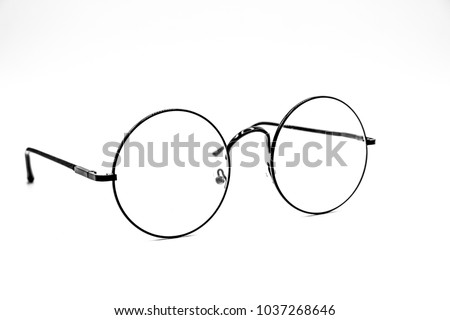 Round Glasses Women.Already used The image is sharp close.Is a good background.Suitable for use. Royalty-Free Stock Photo #1037268646