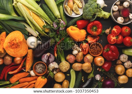 Colorful organic vegetables background. Healthy natural food on rustic table. Grocery shop assortment, fresh cooking ingredients top view