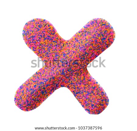 Beautiful Alphabet X , made by multi color sand, isolated on white background