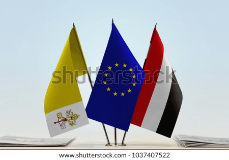 Flags of Vatican European Union and Yemen