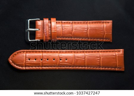 Leather watch wrist strap isolated on black